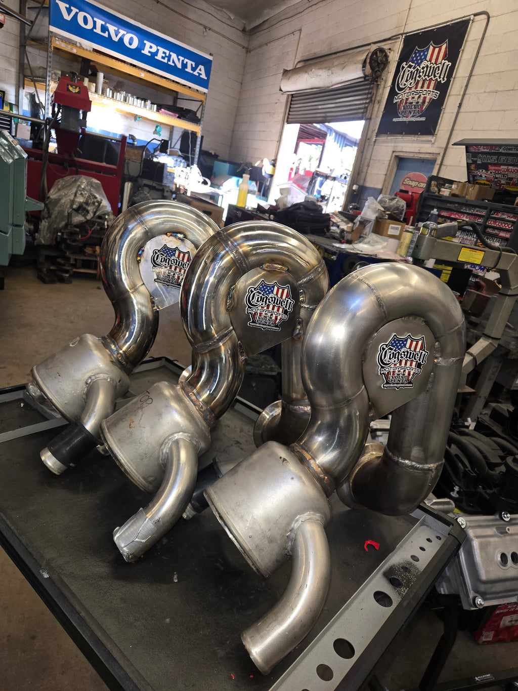 high rise exhaust riser system